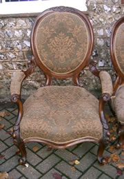 A very nice pair of matching ladies and gentlemans walnut spoonback chairs