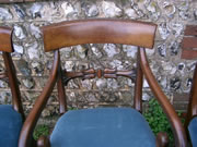 A Will IV Mahogany carver with scroll arms stuffover seat and well carved back in excellent condition