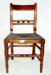 A Country chair in Fruitwood, early C19.