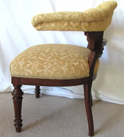 A magnificent large solid oak bowed back chair